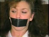 21 YEAR OLD COLLEGE STUDENT CINDY IS TAPE TIED & GAGGED THEN GETS HERSELF FREE (D41-8)