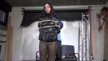 Aiyana bound gagged and suspended ind Shiny nylon down Pants and Jacket