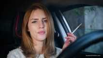 Meet Anastasia in her car while she is smoking two 120mm all white cigarettes