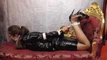 Miss Scarlett bound and hard gagged in a short sexy  PVC outfit