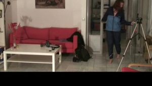 Archive girl chilling in her flat wearing sexy shiny nylon rainwear (Video)