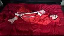 *** HOT HOT HOT*** NEW MODELL*** DESTINY wearing a new sexy red shiny nylon rain suit tied and gagged on bed with ropes and a cloth gag (Video)