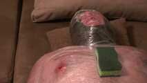 Foiled slave with a bloody nipple