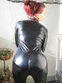 Exclusive pictures in imitation vinyl catsuit