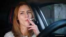 Meet Anastasia in her car while she is smoking two 120mm all white cigarettes
