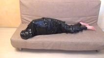 [From archive] Stella - Wrapped completely in black cling film (video)