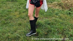 Our new model Miss Amira in transparent plastic rain jacket and patent sprinter shorts