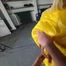 Ms Ungeniert tied, gagged and hooded in shiny nylon yellow Downjacket