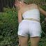 Watching sexy Sonja wearing white shiny nylon shorts and a top during watering the garden (Pisc)