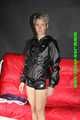 Sexy Sonja wearing sexy shiny nylon shorts and a rain jacket during preparing her sofa with nylon cloth (Pics)