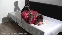 Ivette - tied and gagged in red downcoat