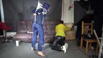 Sandra tied and gagged overhead with ropes and a ballgag overhead prepared to be hunged up by Stella both wearing sexy shiny nylon rainwear (Video) 