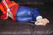 Watching Jill wearing a sexy shiny nylon rain pants and three shiny nylon rain jackets and a life jacket being tied and gagged and HOODED three times (Pics)