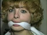 18 YEAR OLD CUTIE FACE TERRI IS MOUTH STUFFED, CLEAVE GAGGED, ROPE GAGGED, CROTCH ROPED, TIED UP WEARING LINGERIE AND BAREFOOT (D56-6)