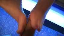 Footjob at the solarium