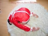 Jill tied, gagged and hooded on the floor wearing a super hot white shiny nylon shorts and a red rain jacket (Pics)