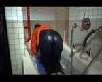 SEXY SANDRA wearing an special orange down jacket and a black down pants during taking a bath playing with water and the downwear (Video)