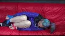 MARA tied and gagged with gymnastics bands and a ball gag - hand to feet wearing a supersexy shiny nylon shorts and rain jacket (Video)
