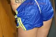 ***HOT HOT HOT***Sandra wearing supersexy blue/yellow shiny nylon shorts and a yellow top tied and gagged over head with ropes and cloth gag (Pics)