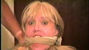 50 Yr OLD REAL ESTATE AGENT GETS GRABBED, TAKEN HOSTAGE, MOUTH STUFFED WITH PANTIES & TIED TO A CHAIR (D62-6)