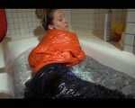 SEXY SANDRA wearing an special orange down jacket and a black down pants during taking a bath playing with water and the downwear (Video)