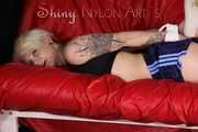 ***COURTNEY***NEW MODELL***being tied and gagged with ropes and a clothgag on a sofa wearing an oldschool blue shorts and a black top trying to get out (Pics)