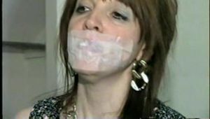 42 Yr OLD DIANE IS BOUND, MOUTH STUFFED, SEMI CLEAR TAPED & CLEAVE GAGGED HOSTAGE (D28-11)