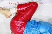 SEXY SANDRA being tied and gagged with ropes and a ballgag on a sofa wearing a SUPERSHINY NEW RED NYLON PANTS and a rain jacket (Pics)