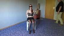 Shelli cuffed and gagged on a chair 1/2