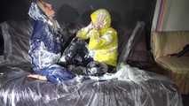 Watching sexy Stella and Sandra having fun with shaving cream and eachother both wearing shiny nylon rainwear (Video)