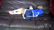 Sexy Sonja being tied and gagged on a sofa with ropes and a clothgag wearing a sexy oldschool blue shiny nylon shorts and a blue rain jacket (Video)