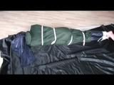 5:00 Min. video with Nicole tied and gagged in a shiny nylon rainsuit and a raincape