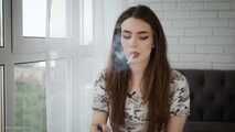 3 clips in 1 compilation of smoking cork 100mm cigarette in apartment