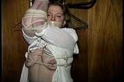 30 Yr OLD BBW SINGLE MOM IS TAPE GAGGED, BAREFOOT, BALL-GAGGED, TIT TIED, NIPPLE PINCHED AND TIED TO A COAT RACK (D73-17)