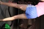 Watching ***MIA*** wearing a hot lightblue shiny nylon shorts and a pink top during vacuuming the studio (Pics)