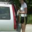 One of our archive girls ties and gagges the other one outdoor in car wearing shiny nylon shorts (Video)