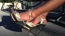 Dangling with sexy golden platforms