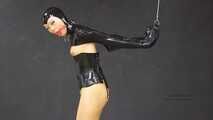 Gagged rubber doll in monogloves