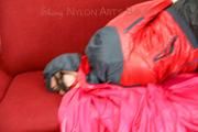Jill tied, gagged and hooded by Sophie wearing a sexy red/blue rainwear combination (Video)