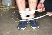 Katharina tied and gagged in shiny nylon shorts