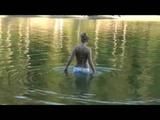 Jenny swimming in the sea wearing sexy shiny nylon shorts and a bikini top (Video)
