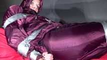 Pia being tied and gagged with tape on a sofa wearing sexy purple shiny nylon downwear (video)