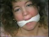 25 YR OLD CHARLENE HAS RAG & SPONGE STUFFED IN MOUTH, CLEAVE & ACE BANDAGE GAGGED, BLINDFOLDED & BALL-TIED (D39-2)