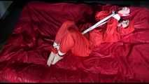 *** HOT HOT HOT*** NEW MODELL*** DESTINY wearing a new sexy red shiny nylon rain suit tied and gagged on bed with ropes and a cloth gag (Video)