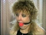 BEAUTIFUL DOE EYED REBECCA IS BALL-GAGGED, MOUTH STUFFED, TAPE GAGGED & BLINDFOLDED (D33-4)