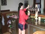 Jill Diamond woring on a bar wearing a sexy shiny nylon shorts and a rain jacket (Video)
