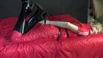 ***HOT***HOT***HOT***Mia wearing a sexy red shiny nylon jumpsuit and black shiny heel rubber boots being tied and gagged with belts and a clothgag (Video)