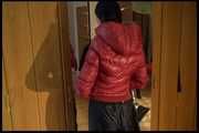 Lucy wearing a sexy very thin adidas rain pants and a red shiny down jacket posing infront of the mirror (Video)
