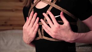 Posing in tight jute shibari