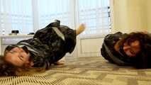 Terry and Vanessa - Trash bag games: both girls are packed in trash bags on the floor (video)